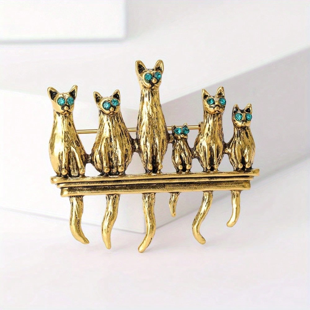 Vintage Fashion Enthusiasts - Broche vintage en forme de famille
